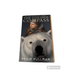 The Golden Compass 🧭 by Philip Pullman 📕